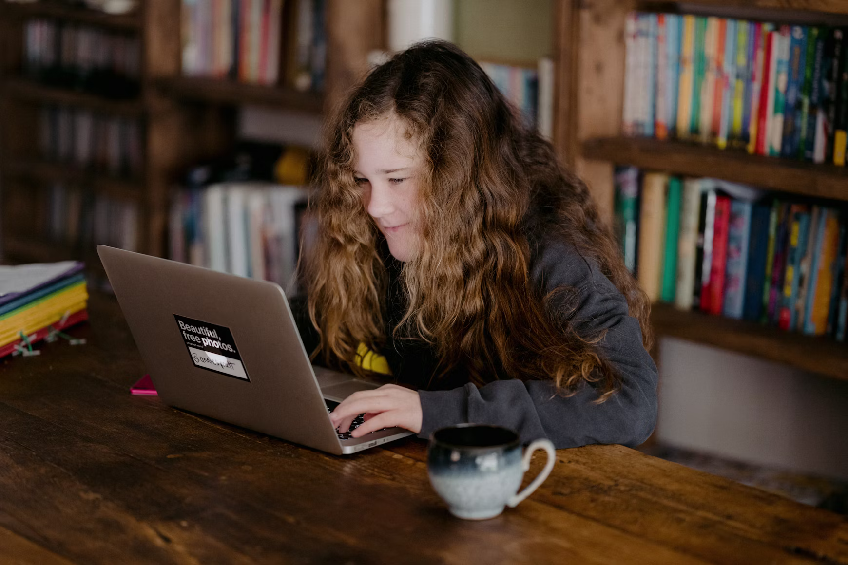 Teen Typing on computer